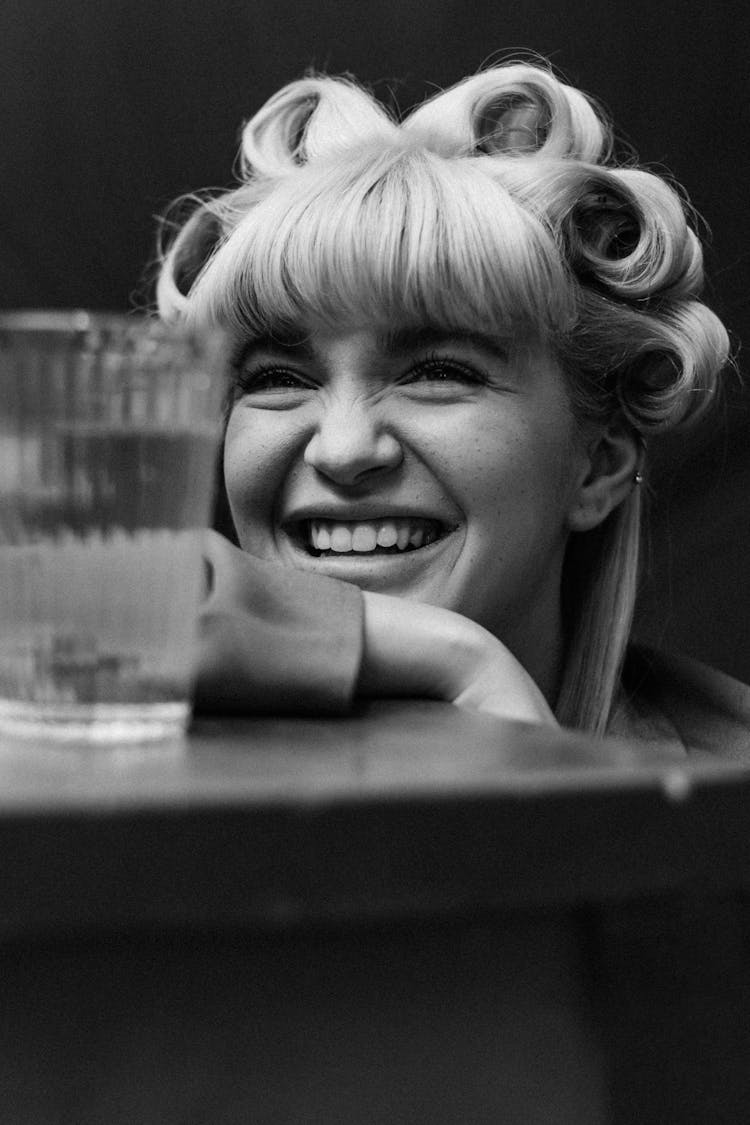 Smiling Woman Face Near Glass Of Water 