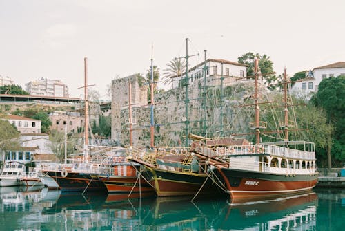 Row of Ships Moored at the Pier