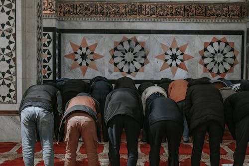 People praying in a mosque