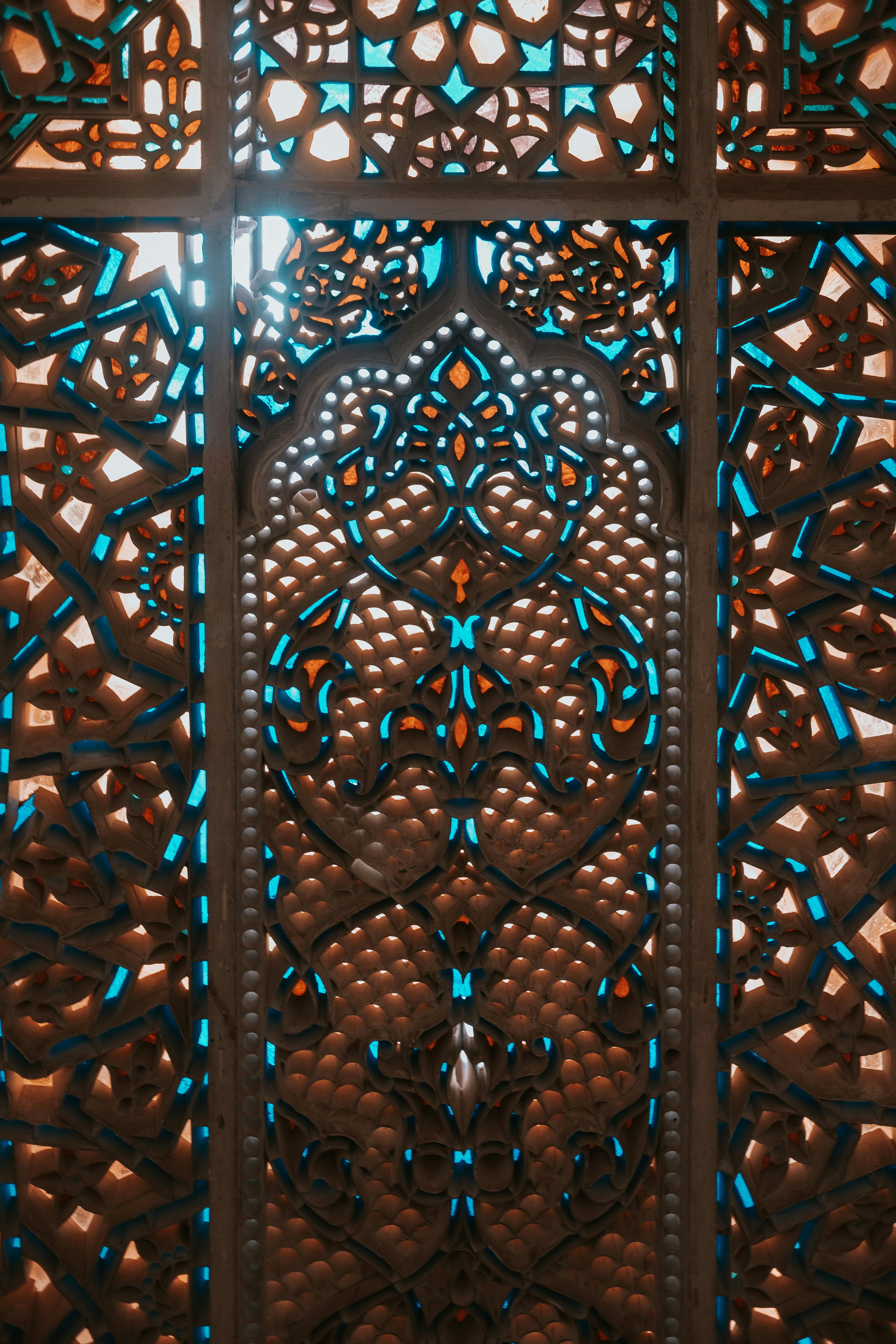 a window with intricate designs in it