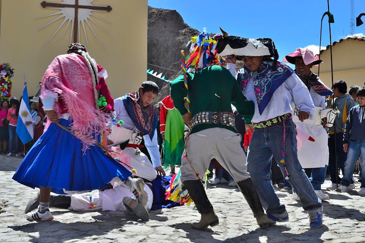 People In Traditional Clothing Celebrating In Town