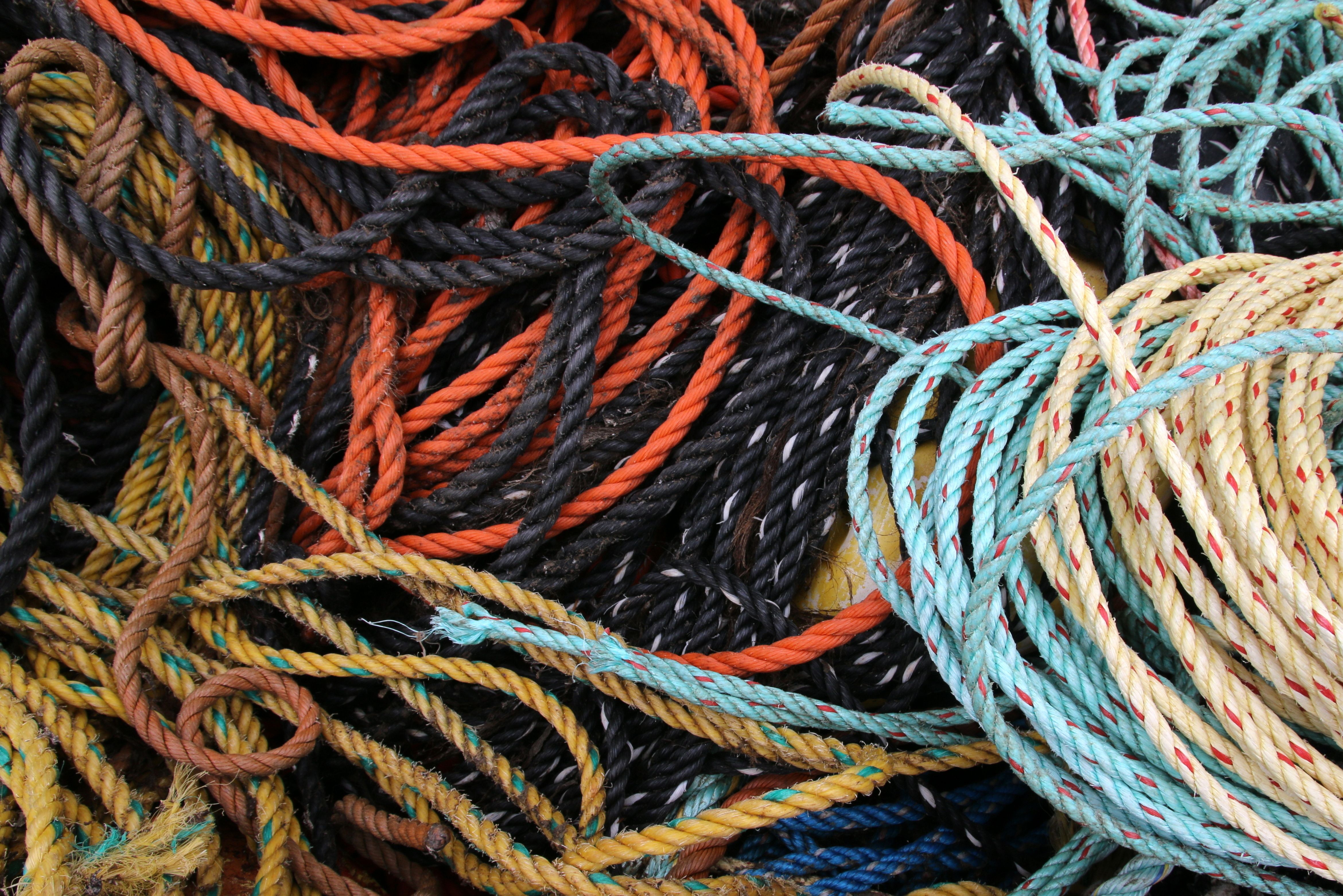 A colorful arrangement of coiled ropes capturing a nautical theme in Peggys Cove, Canada.