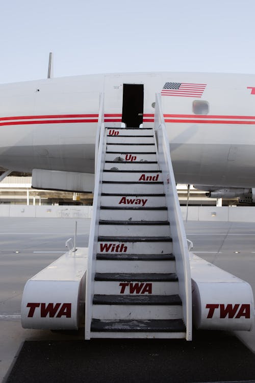 Boarding Ramp Standing by a Passenger Airplane