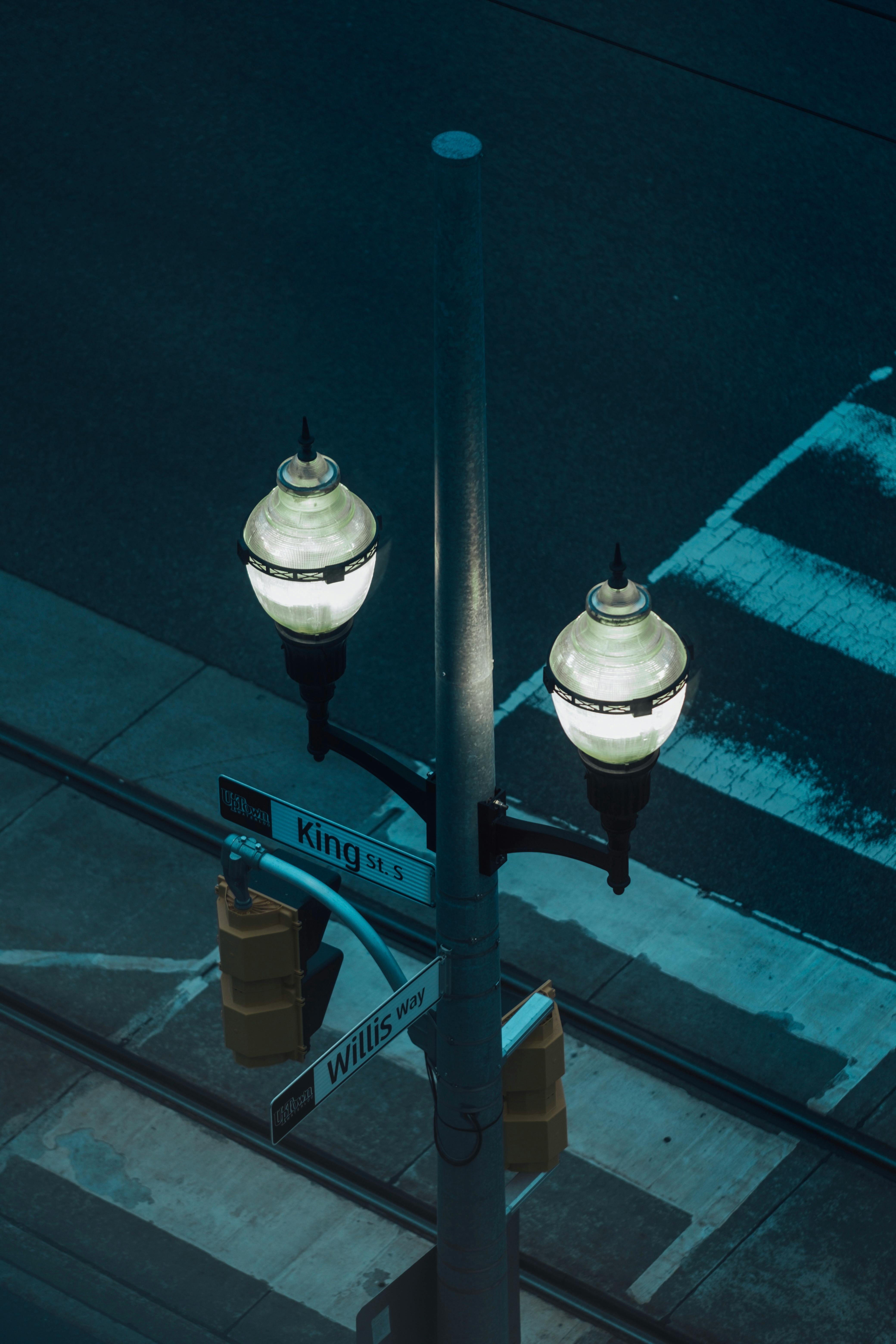 Aerial view of street lamps and crosswalk at King St S and Willis Way in Waterloo, Ontario, Canada.