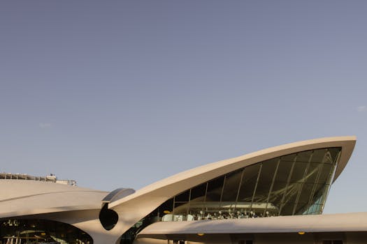 Explore the architectural marvel of the TWA Flight Center at New York's JFK Airport.