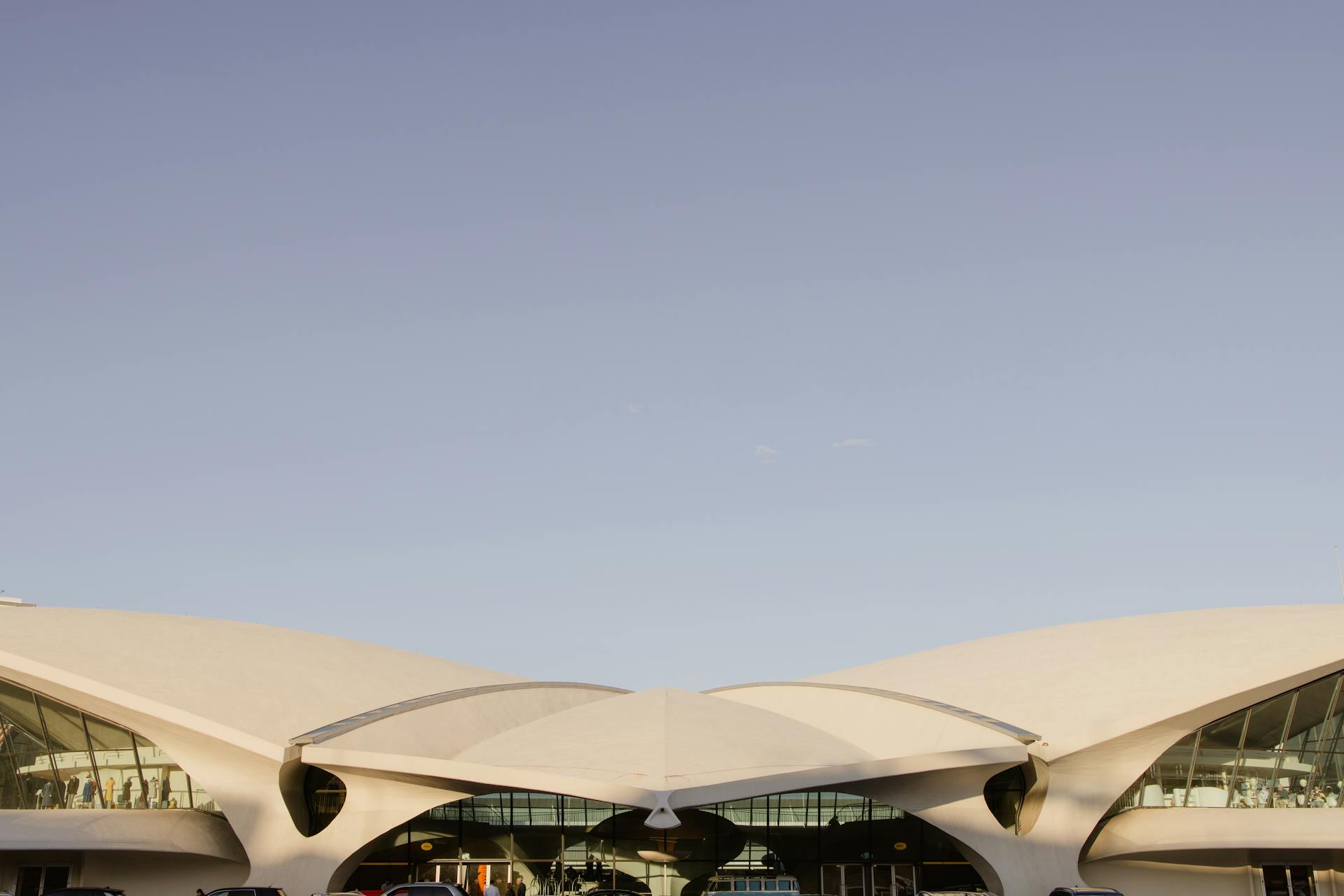 Stunning architectural design of the TWA Flight Center in New York's JFK Airport captured in daylight.