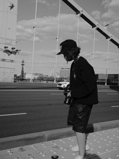 Photographer on Suspension Bridge