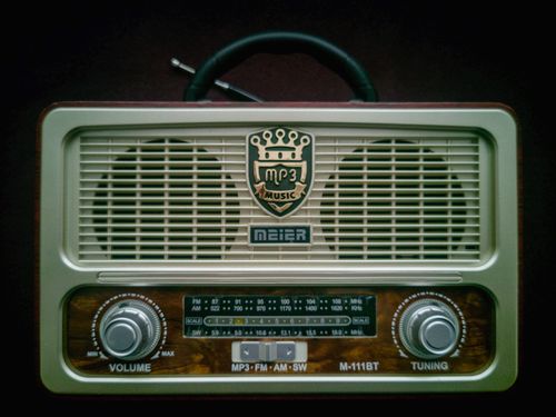 Free Close-up of a vintage style radio with MP3 playback, showcasing retro design and classic features. Stock Photo