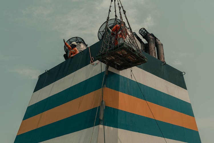 Men Painting Ship Chimney