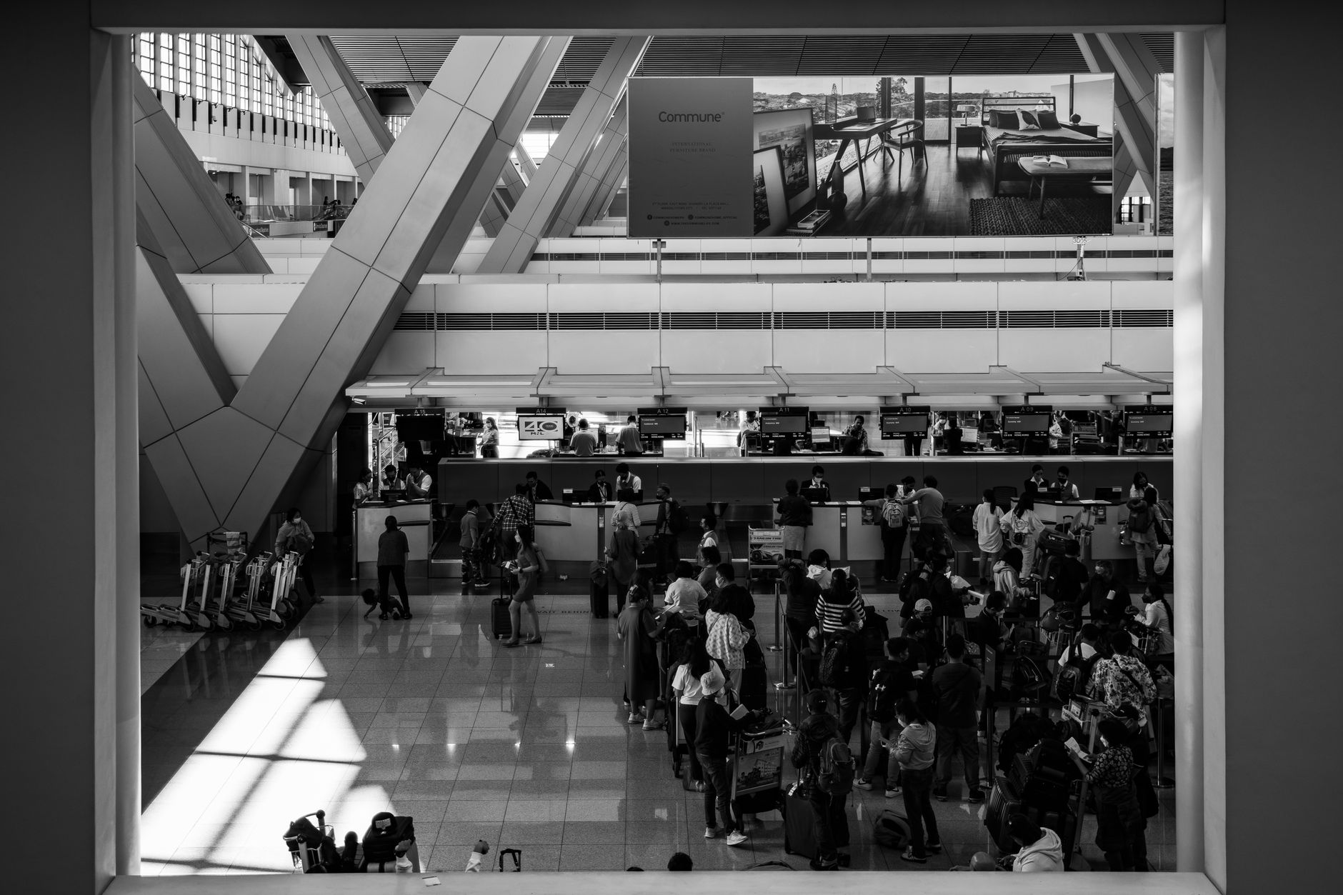 DFW Airport terminal with travelers for World Cup