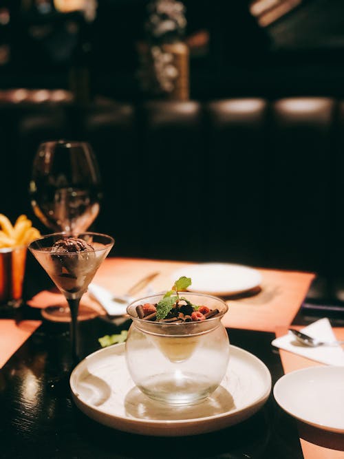 Cocktail Glass Beside Plate With Cup