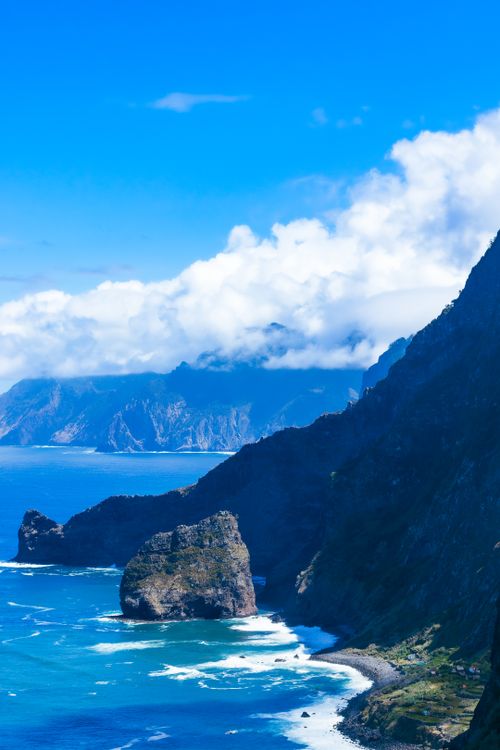 Free Stunning aerial view of the rugged coastal cliffs in Santana, Madeira, capturing the beauty of nature. Stock Photo
