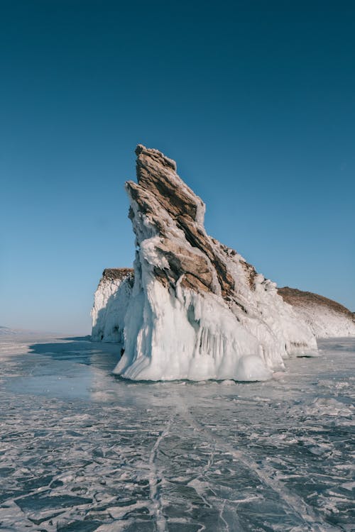 Frozen Rock Formation on Sea Shore