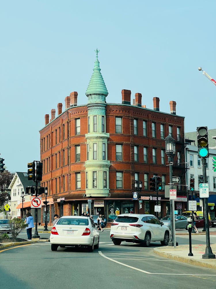 Cars On The Street In Front Of The Bigelow Block In Medford, Massachusetts