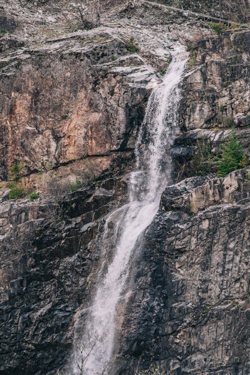 Waterfall Flowing through Rocks