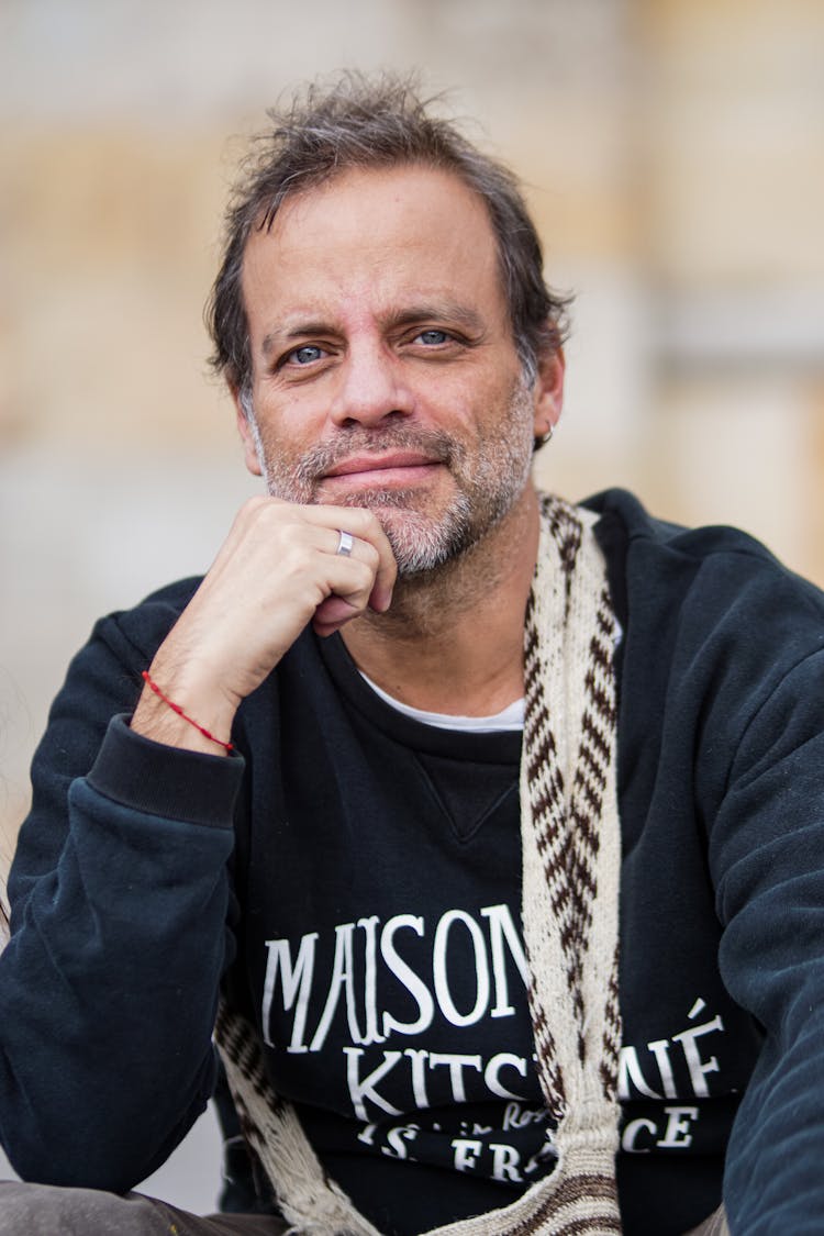 Portrait Of A Mature Man Sitting Outside 