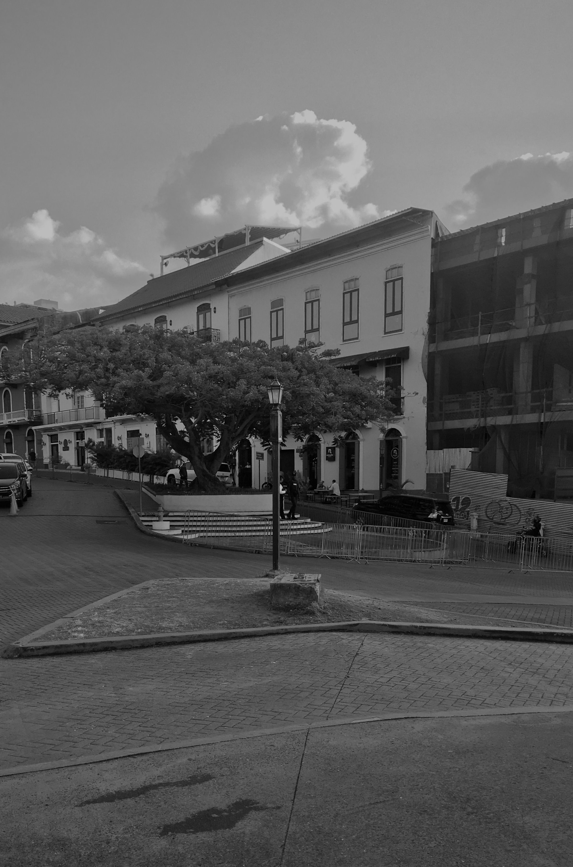 People behind Empty Street in Black and White · Free Stock Photo