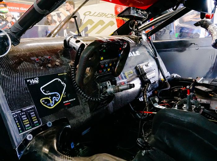 Competition car cockpit interior, by Caio Renato de Campos on Pexels