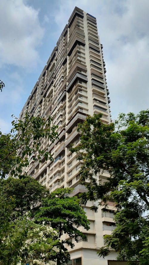 Low Angle Shot of a Tall Block of Flats 