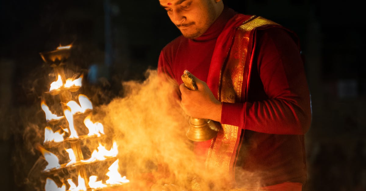 Man in Traditional Clothing at Ritual at Night · Free Stock Photo