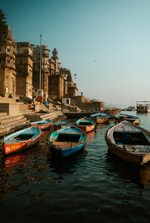 Boats on the Ganges River and a Hindu Temple 