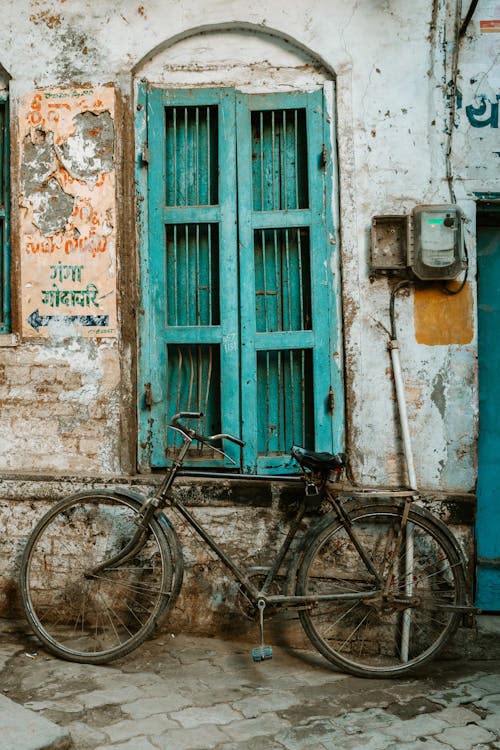 Bike by Vintage Building Wall