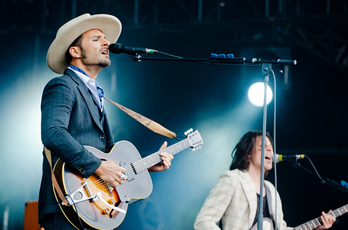 Empty concert venue with lights on the stage before a rock show