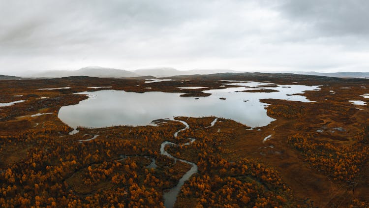 River And Lake Under Clouds