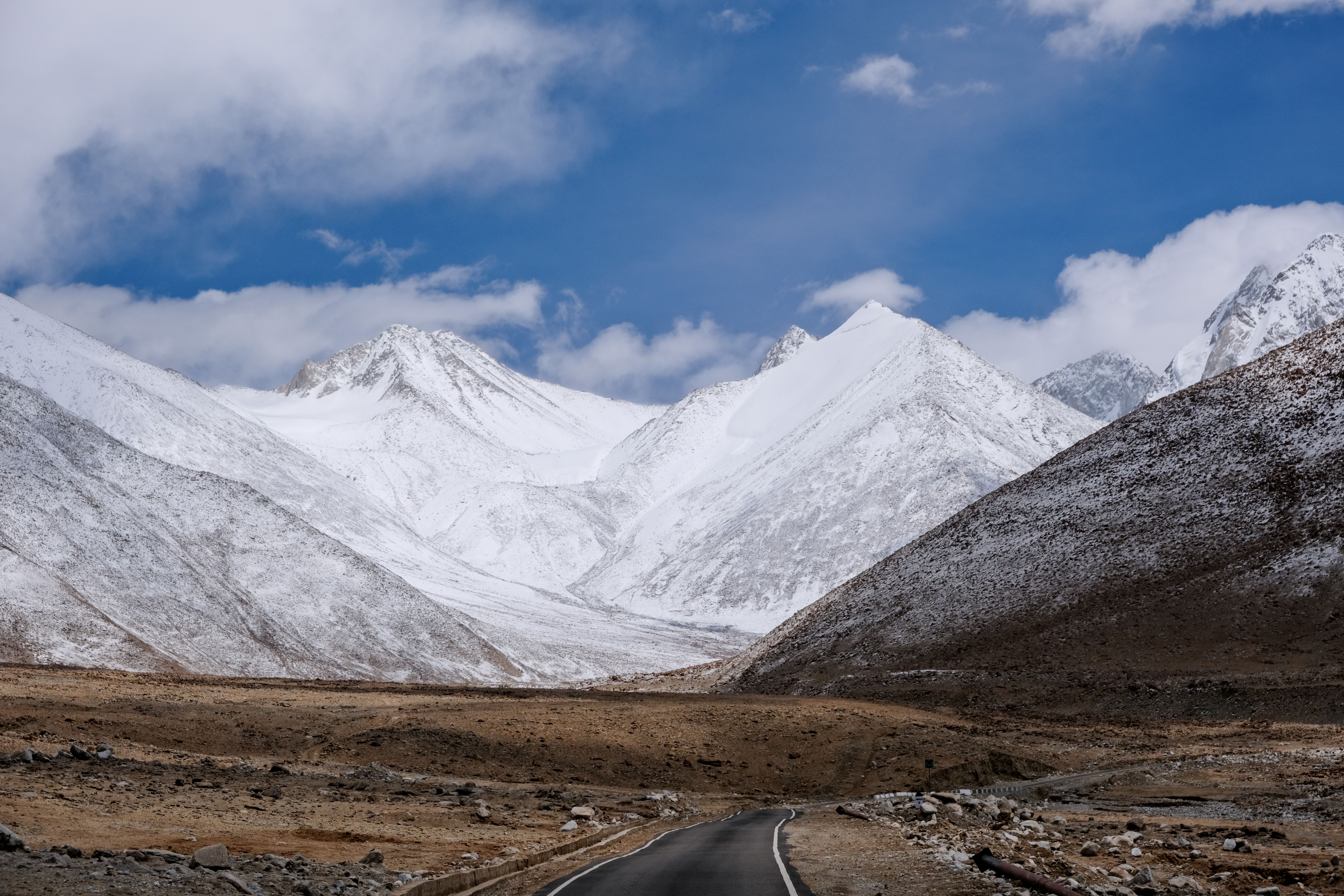 A Road in a Mountain Valley · Free Stock Photo