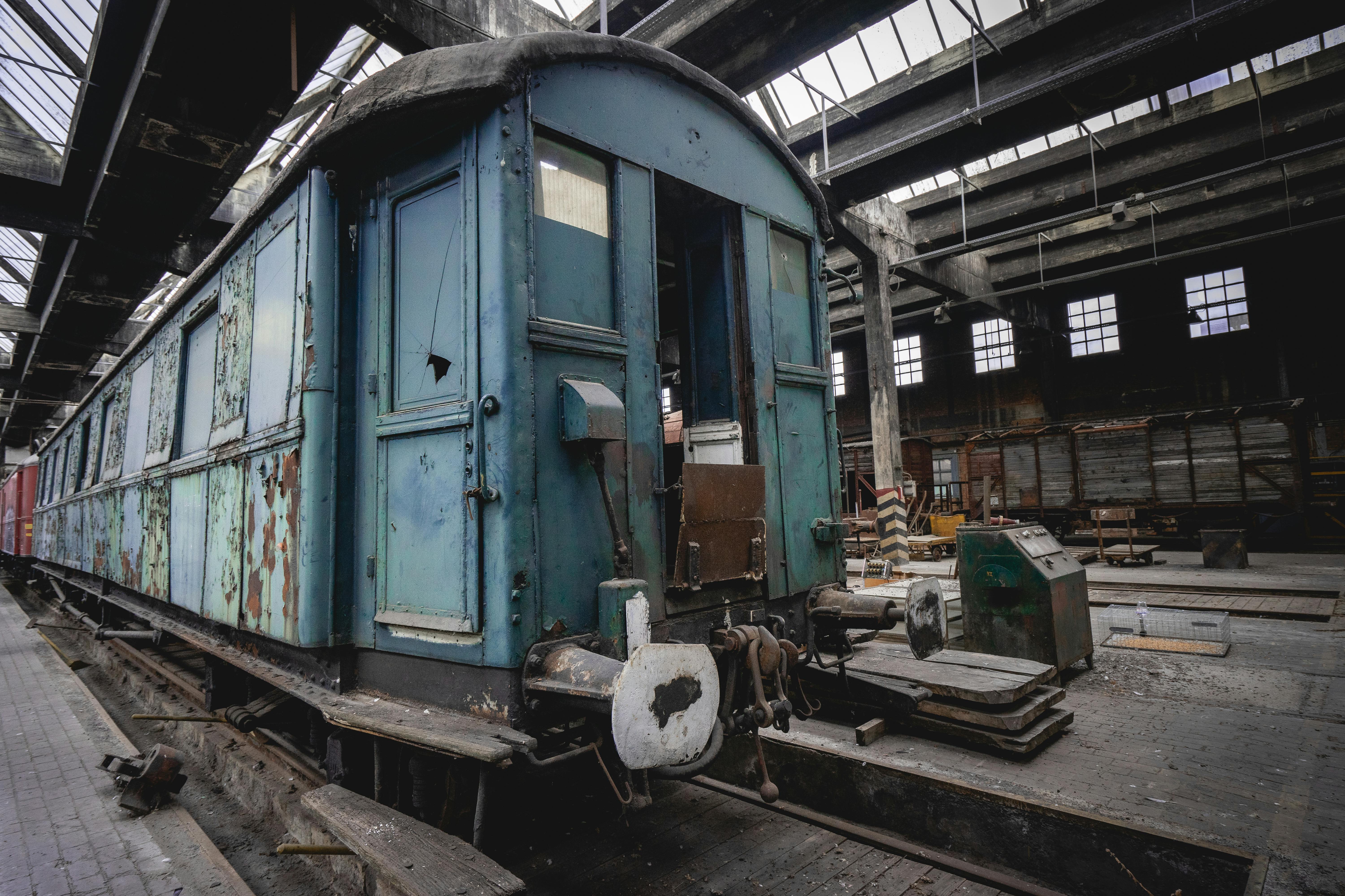 Old warehouse with abandoned trains somewhere in Belgium, Urbex. · Free  Stock Photo