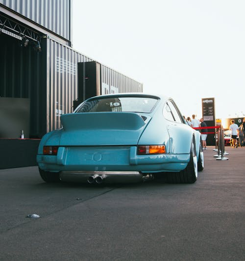 A Blue Car on the Street