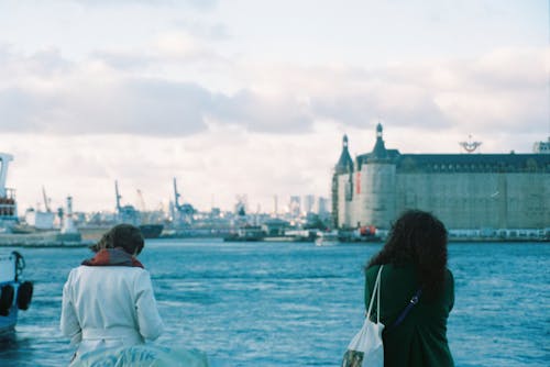 Woman on the Bridge Looking at the Castle