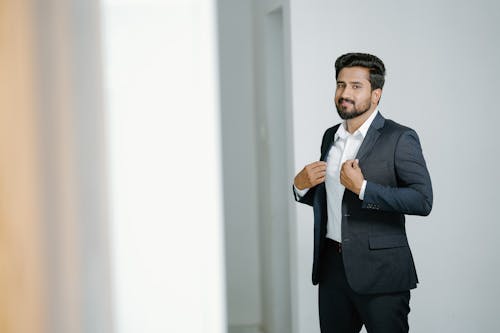 Model in a Gray Suit and White Shirt