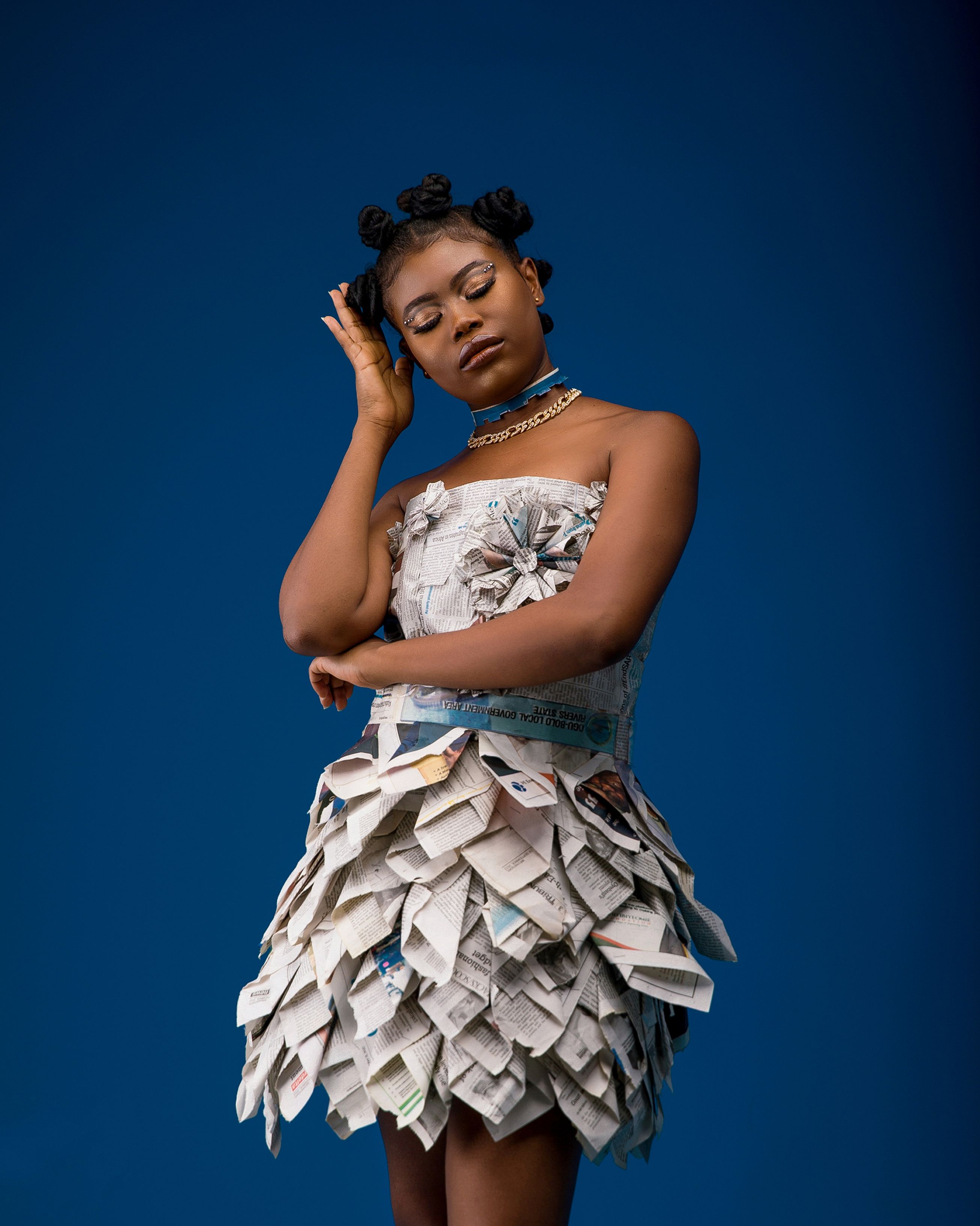 Beautiful Woman in Newspaper Dress  Free Stock Photo