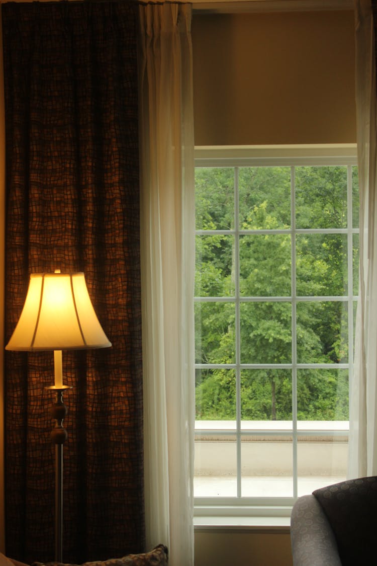 Retro Lamp Near Window At Home