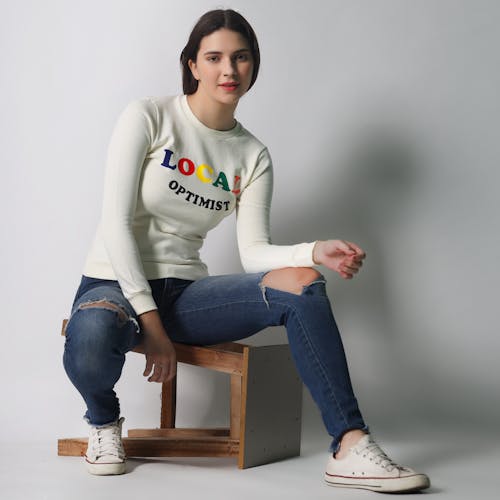 Young Woman in Casual Wear Posing on White Background