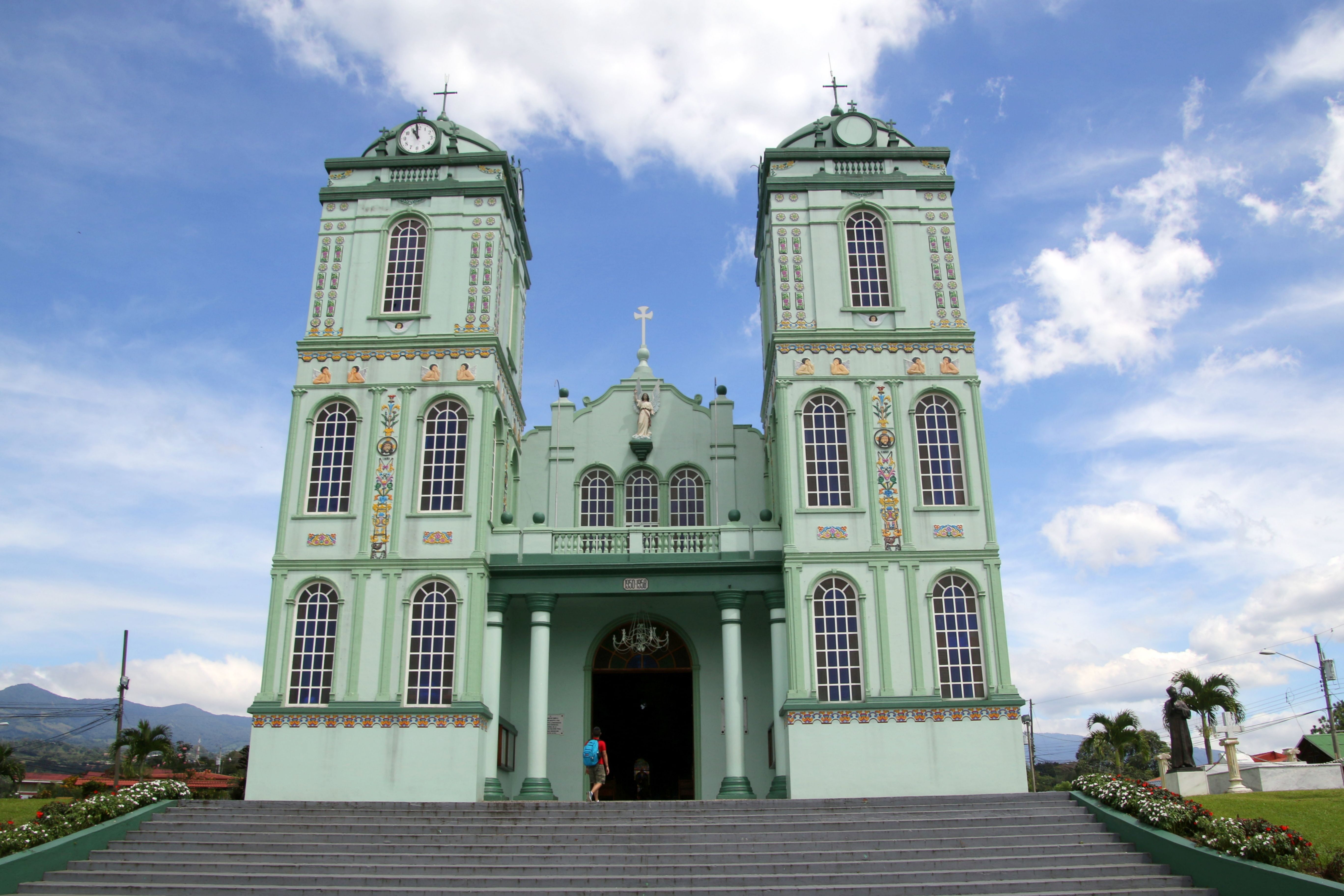 Elegant traditional church in La Fortuna, Costa Rica, captured under a clear blue sky. - La Fortuna