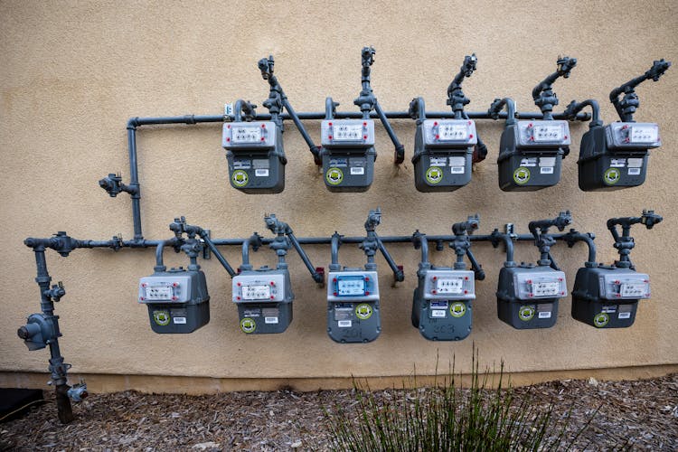 Electricity Boxes On Wall