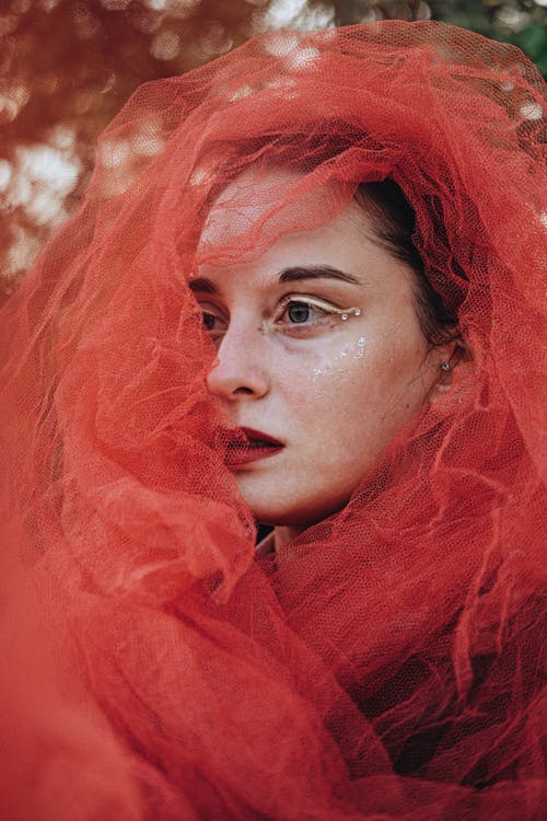 Red Veil on Woman Face