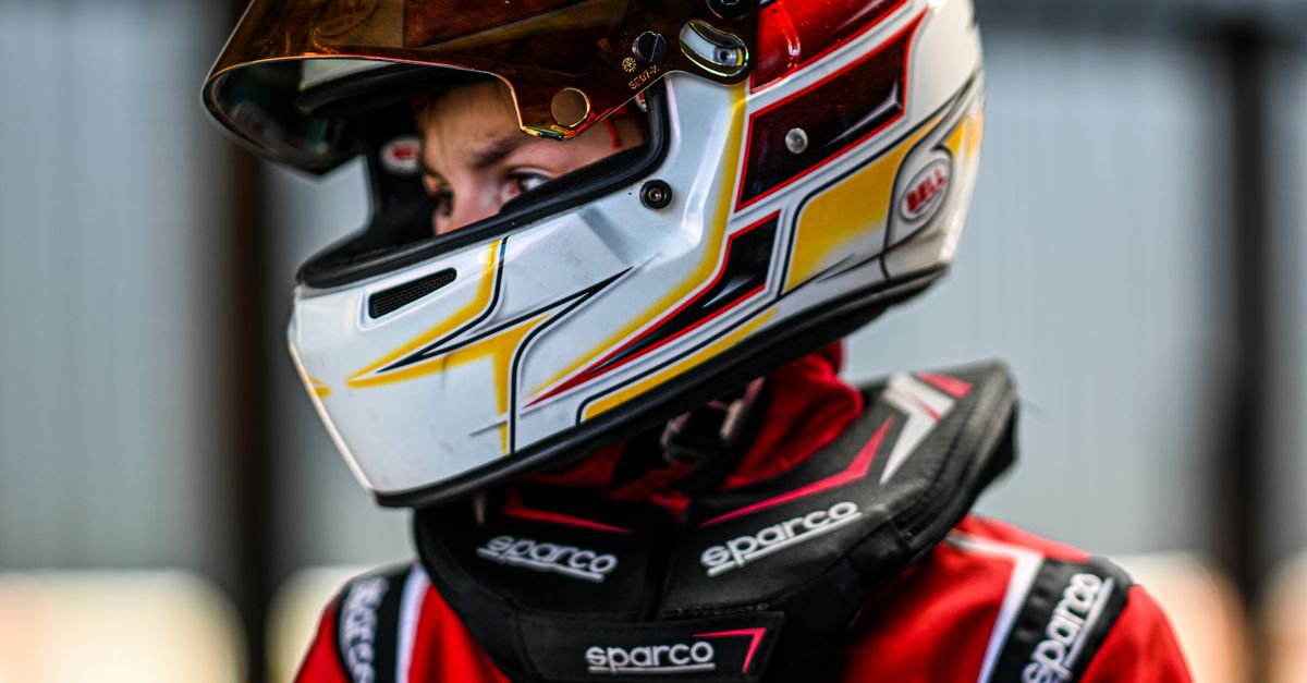 Boy Racer Drivers A Boy in a Racing Suit and Helmet · Free Stock Photo