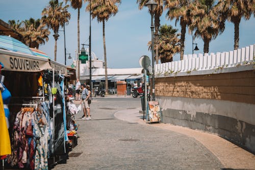 Free Market Stalls on the Street with Palm Trees  Stock Photo