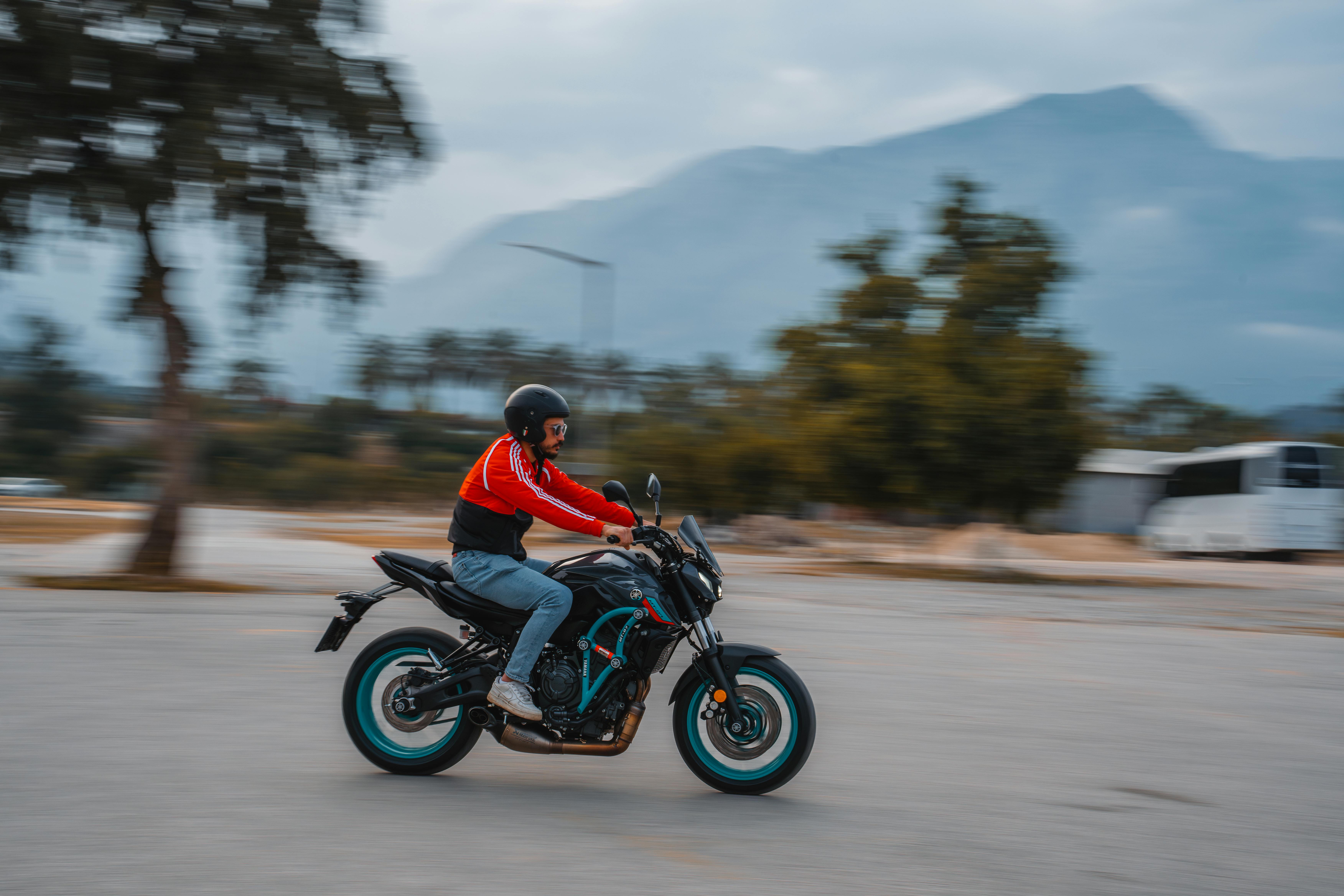 Man Riding Motorbike on Road · Free Stock Photo