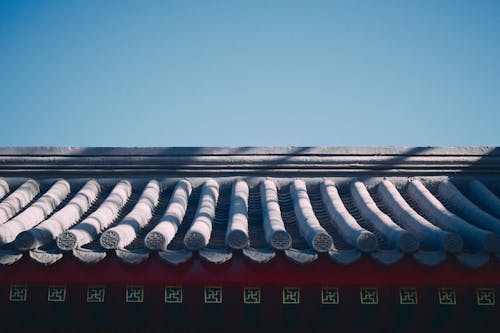 Free Decorative Roof Tiles of a Traditional Korean Roof Stock Photo