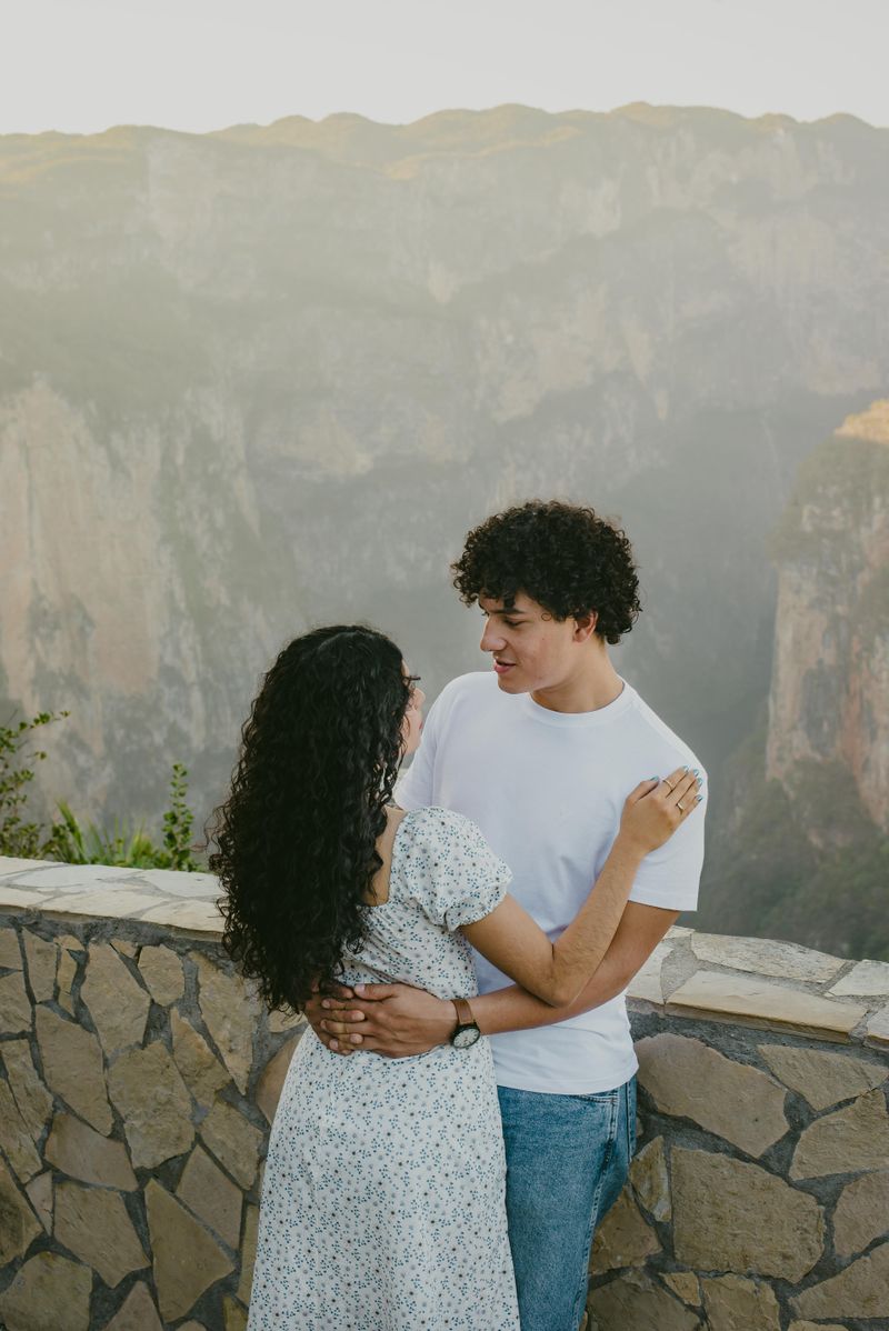 Couple embracing with mountain view