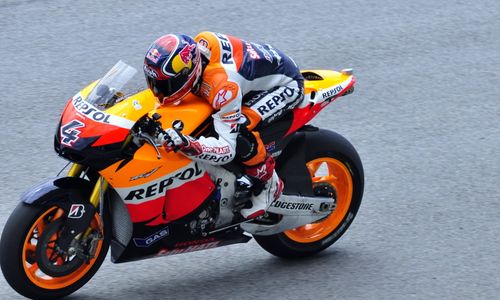 Free MotoGP racer speeding on track at Sepang International Circuit in Malaysia. Stock Photo