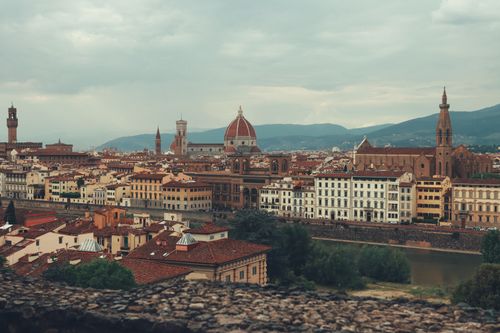 Free Stunning aerial view of Florence's historic center with the iconic Duomo and city skyline. Stock Photo