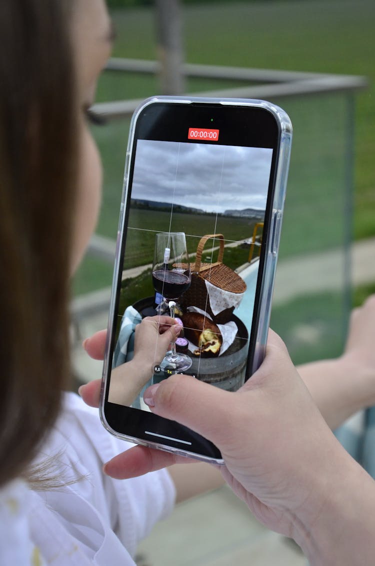 Close Up Of Woman Recording Video Of Drink And Food