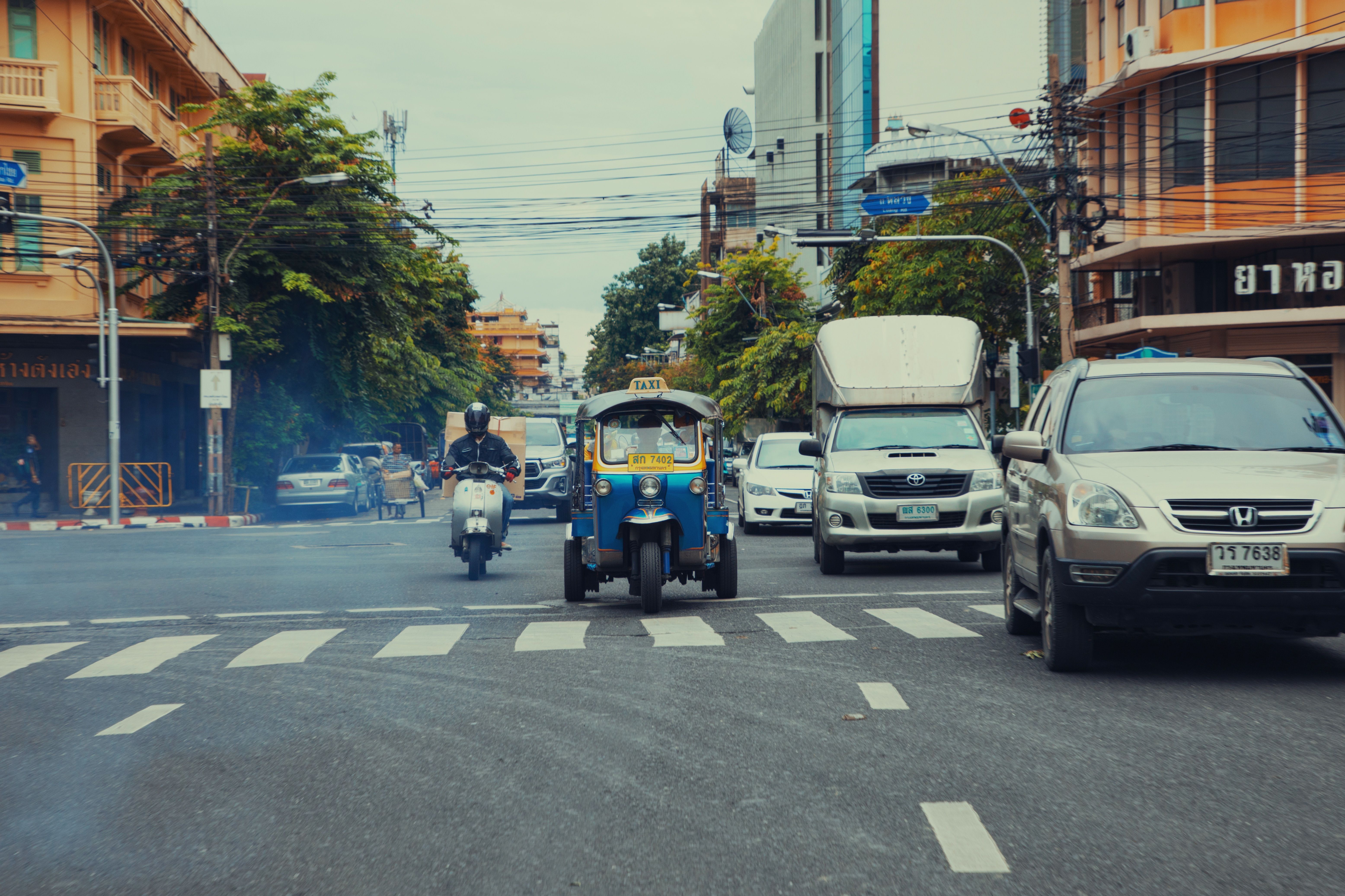 Empty Bangkok street shimmering in April afternoon heat