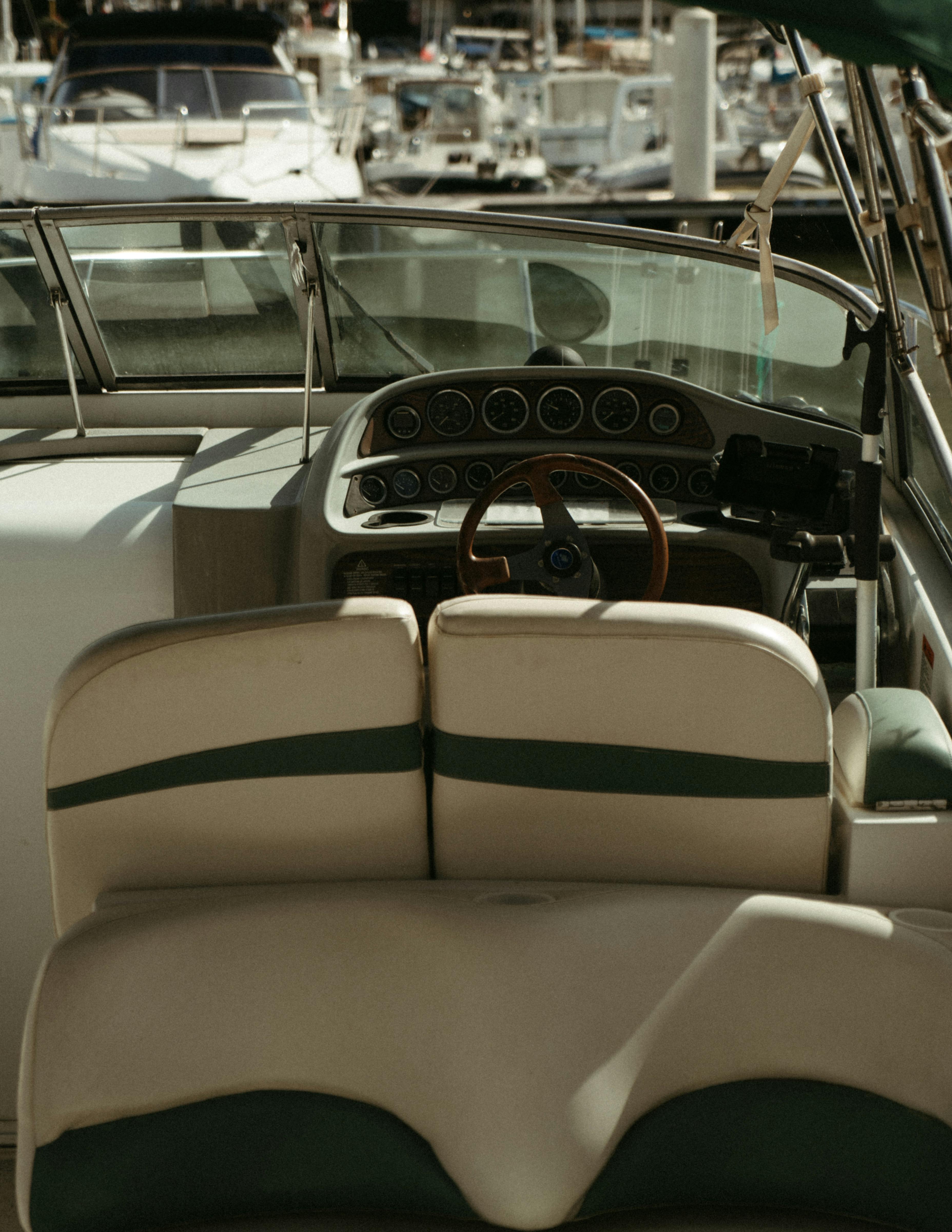 Seats and Steering Wheel in Motorboat · Free Stock Photo