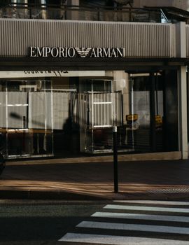 Emporio Armani store facade with a zebra crossing, located in Cannes, France.